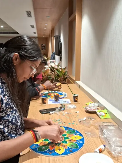 Deep in concentration, this participant is carefully adding details to her Lippan art piece. The process itself is incredibly calming and allows for a state of creative flow, which is a welcome escape from a busy workday.