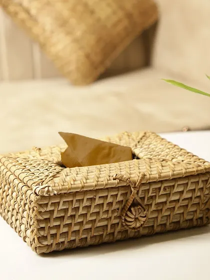 Our woven rattan tissue box, placed on a side table, adds a touch of warmth and texture to the living space. It's a simple swap that enhances your decor while embracing sustainable materials.