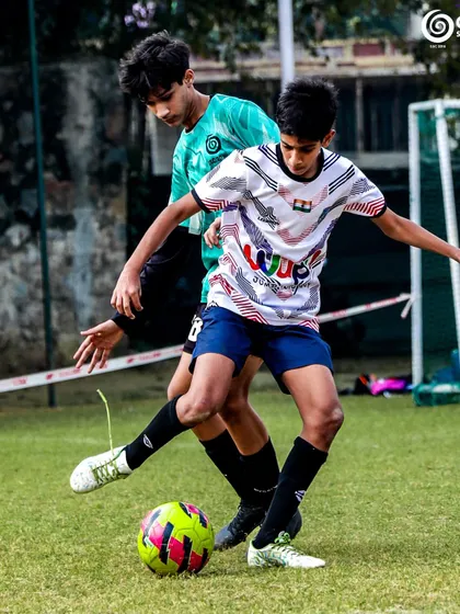 Skillful footwork on display as a player tries to outmaneuver their opponent.
