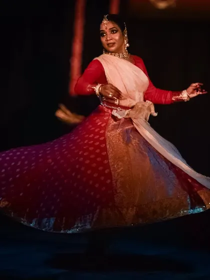 The sheer energy of a Kathak spin, with the costume creating a beautiful circular form.
