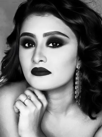 Elegance in monochrome. This black and white divine makeup look is a powerful demonstration of how to create drama and dimension using only shades of black, white, and grey.