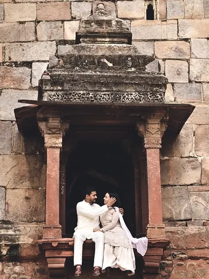Using the architectural details of a historic monument, we framed this couple in a window for a timeless, regal portrait. These locations provide a majestic backdrop for pre-wedding photography.