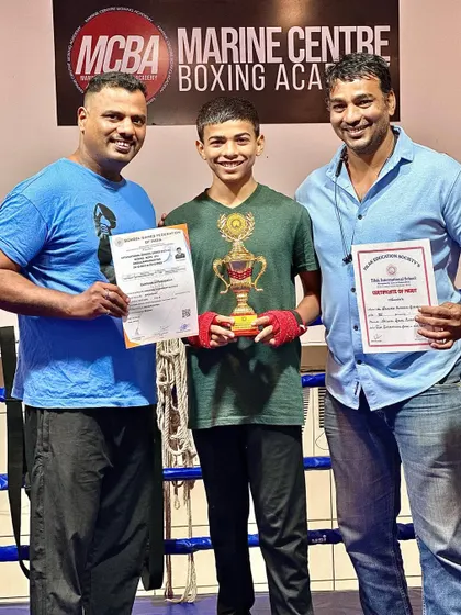 Coach Darshak Pawase and I with Himanshu and his award.