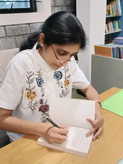 Author Pika Nani signing a copy of 'The Egghead Detective Agency'. Her visit was a massive hit with our mystery-loving kids.