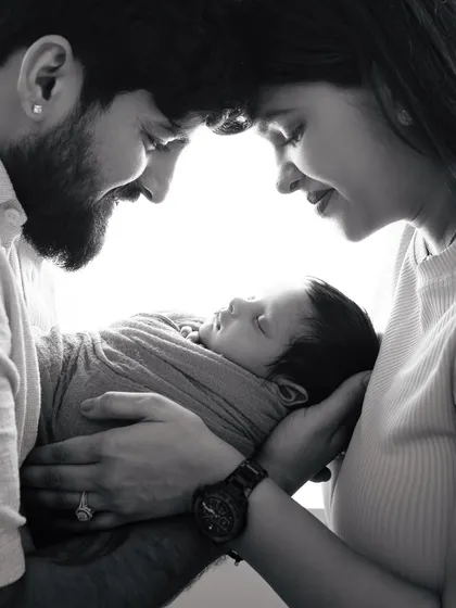 The emotions these little details hold are unparalleled. A black and white version of the classic parent and newborn portrait.