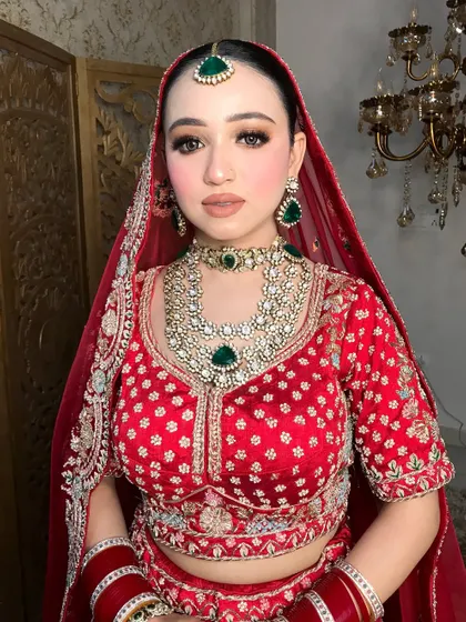 A close-up showcasing the detailed eye makeup and the perfectly blended skin finish.