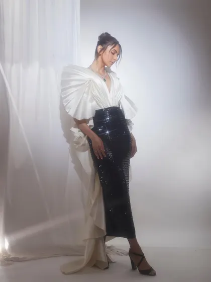 A full look at the Tanieya Khanuja gown for Rakul Preet Singh. The combination of the pleated, sculptural top and a sequined pencil skirt made for a standout ensemble at the Pinkvilla Style Awards.