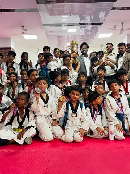 A full house of winners. The entire academy celebrates a successful haul of medals and trophies.