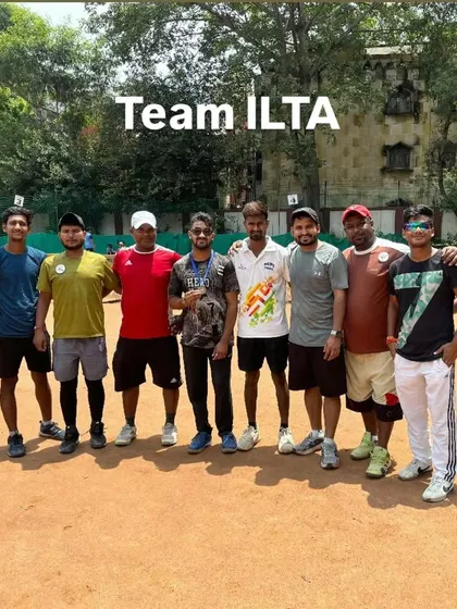 Team ILTA. This photo includes our coaches and some of our senior players, representing the strong community we have built at the academy.