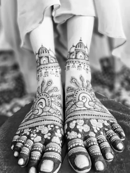 A black and white photo of the peacock and temple feet design, highlighting the beautiful contrast and symmetry.