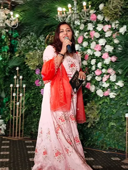 In my element, on stage with a mic in my hand. This is where I feel most alive, connecting with the audience and creating magical moments.