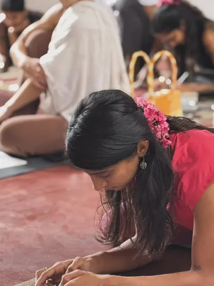 A quiet moment of journaling and reflection during a retreat. The practice of yoga extends off the mat into how we process our thoughts and experiences.