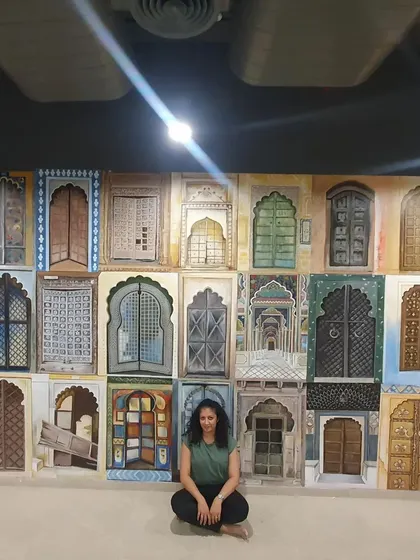 Taking a moment to sit and appreciate the finished 'Doorways of India' mural. Each door tells a different story.