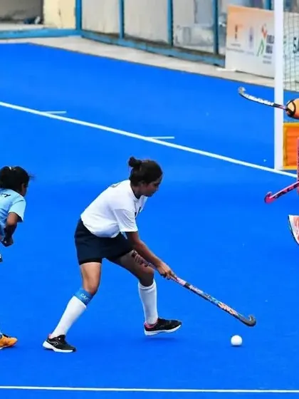 An action shot from our 10-0 victory against Annantpur Hockey Academy. Here, my player skillfully controls the ball, pushing the attack forward in the opponent's half.