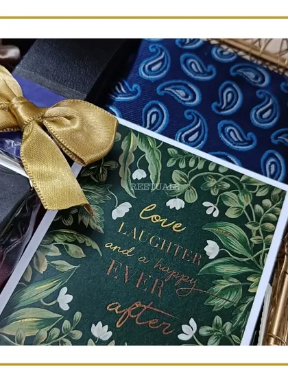A 'Love, Laughter and a happy ever after' card, perfect for adding to any wedding or anniversary gift.