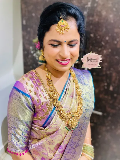 A pretty and elegant makeover for the mother of the groom. The makeup is soft and flattering, perfect for the reception.