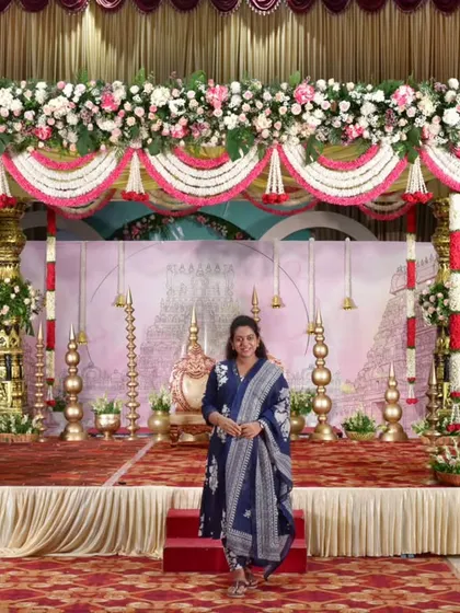 A moment of pride in front of a beautiful wedding stage. My advice is to do something today that your future self will thank you for.