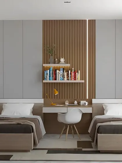A modern shared bedroom with two single beds separated by a central study desk, featuring a wood-paneled accent wall.