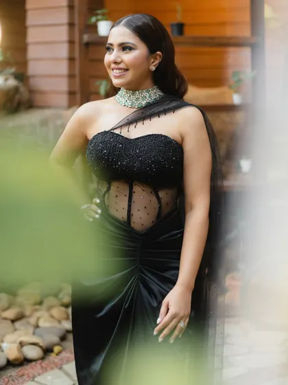 A gorgeous bride in a stunning black gown for her cocktail party. We love capturing the fashion and glamour of pre-wedding events.