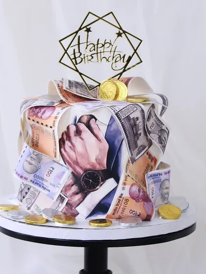 A super popular money-themed cake to wish your loved ones wealth and abundance. This design is wrapped in edible currency notes and topped with edible gold coins, making for a fun and prosperous birthday celebration.