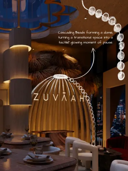 Cascading beads form a dome in this transitional space at Zuvaah, turning a simple passageway into a tactile, glowing moment of pause. This detail shows our focus on creating sensory experiences.
