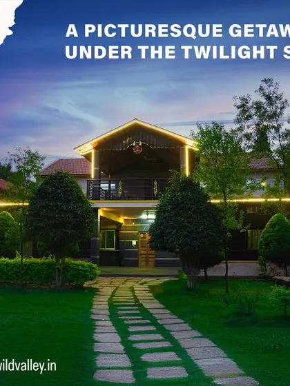 The view of our Mountain Bear resort in Ramanagara under the twilight sky. It's a picturesque getaway that feels a world away from the city bustle.