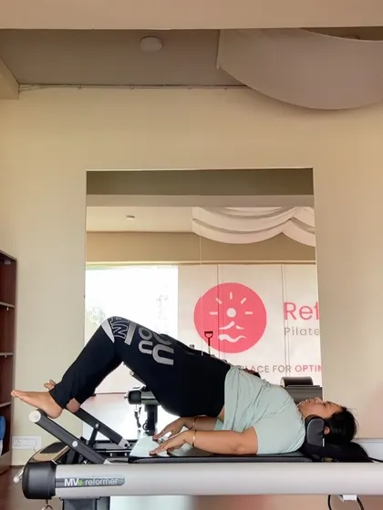 A perfect example of a foundational reformer exercise. The glute bridge is a staple in my beginner sessions as it's safe, effective, and teaches essential core engagement.