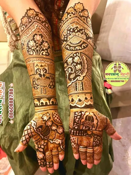 This design showcases a beautiful blend of peacocks, elephants, and lotus motifs. The intricate patterns and clean lines demonstrate my expertise in traditional henna art.