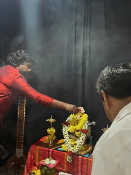 A moment of prayer and offering during the Saraswati Pooja at our music school.
