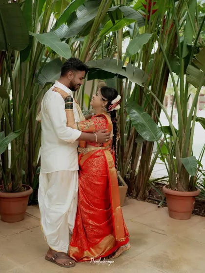 A sweet moment of the couple looking at each other, ready to begin their dance. Their smiles reflect the joy and excitement of their wedding day.