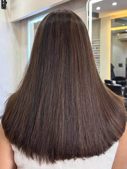 A subtle and sophisticated Espresso Brown highlight affair. This is perfect for adding dimension to dark hair for the wedding season.
