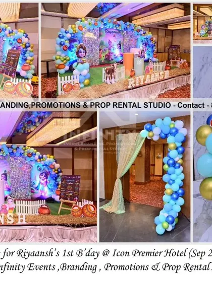 A divine Krishna theme for a first birthday at Icon Premier Hotel. This grand setup includes a sequin backdrop, an ornate balloon arch, and multiple themed props and milestone boards, creating a beautiful and traditional celebration.