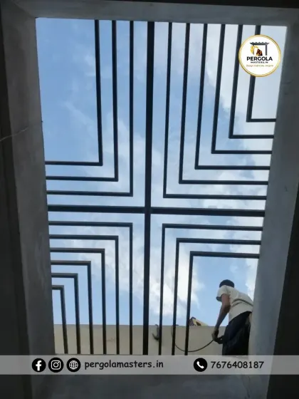 A minimalist yet powerful skylight design featuring a concentric square pattern. This structure is designed to draw the eye upward and channel light directly into the core of the building, as seen here during the installation phase.
