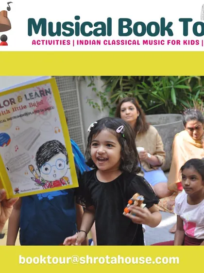 A little girl's happy face says it all! She is thrilled to get her own copy of the "Color & Learn with Little Bajo" activity book.