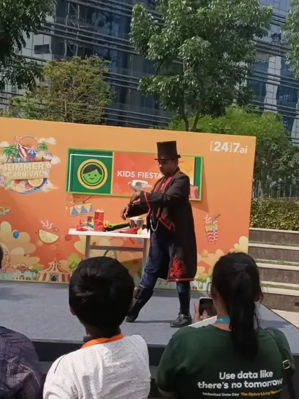Performing at an outdoor corporate carnival for 24/7.ai. I can easily adapt my show for any setting, bringing the full stage experience to your company's campus for a fun-filled family day.