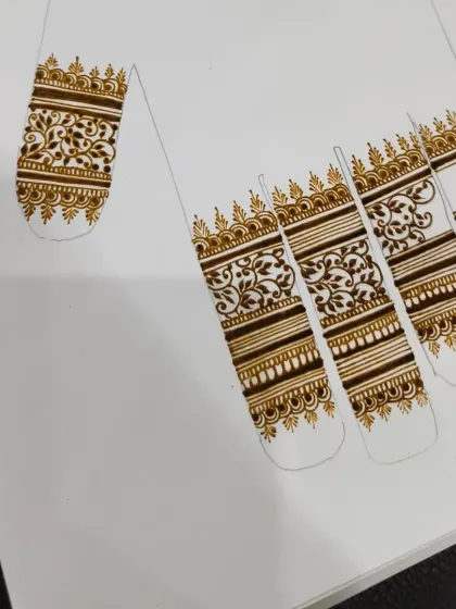 Practicing finger designs is just as important as the main pattern. Here, I'm working on getting the spacing and details just right for each finger.