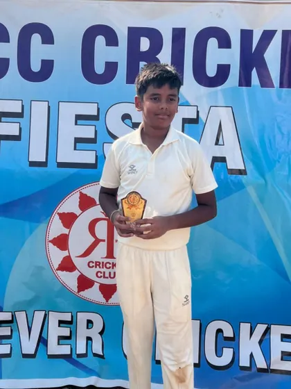 Aniruddh M posing with his trophy.