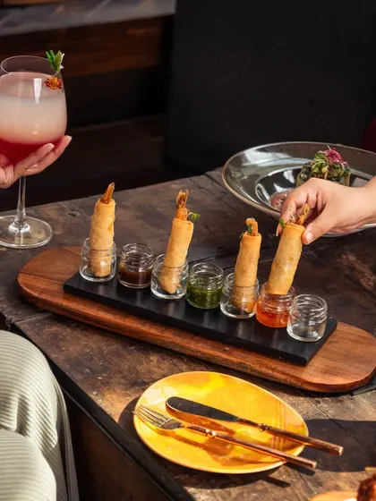 Crispy, flavorful, and packed with freshness. Our prawn spring rolls are the perfect bite-sized delight to brighten up your day, served with a variety of dipping sauces.