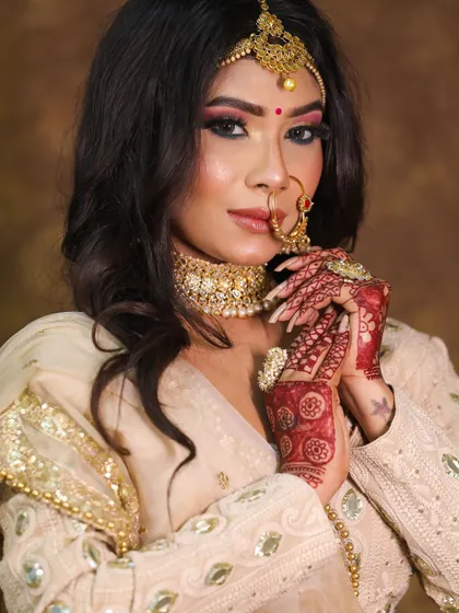 A beautiful bridal portrait. This look features a soft smokey eye, a nude lip, and loose waves for a modern and romantic feel.