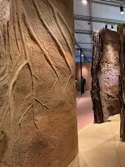 A repeat of image 67, showing the 'Soil' installation's debossed root textures.