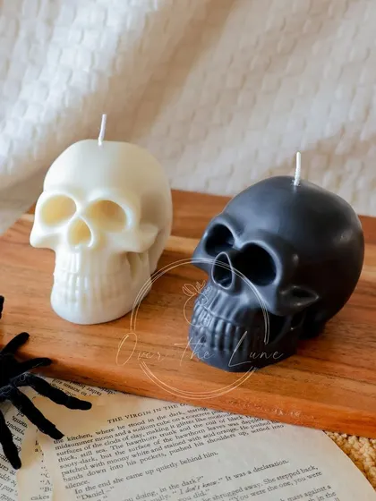 My skull candles are a must-have for any spooky Halloween setup. I offer them in both black and white.