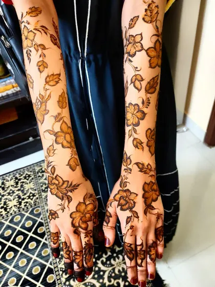 Another view of the floral sleeve, showing how the pattern extends from the wrist to the elbow.