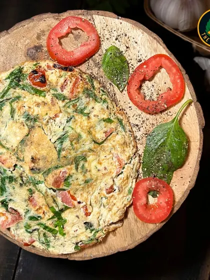 This spinach and tomato omelette is another one of my breakfast favorites. It's a great way to get in your greens and protein first thing in the morning.