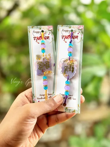 For the "Little Bro" or "Pyara Bhai," these custom resin rakhis are a perfect choice. The beautiful pastel colors and personalized messages make them a heartfelt gift for Raksha Bandhan.
