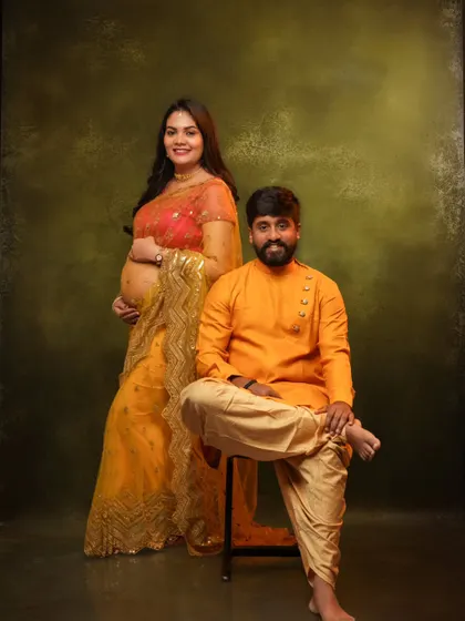 A stylish and relaxed couple's portrait, showcasing their happy and confident personalities.