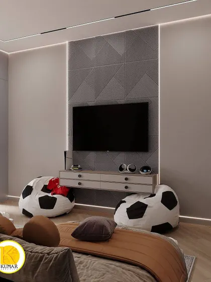 The entertainment zone in the room, with a wall-mounted TV and a floating console.