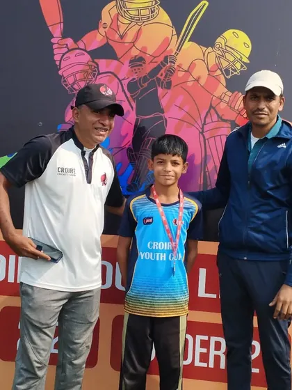 Saujas Jaiswal, who took a hat-trick, receiving his best bowler award. A rare and incredible achievement.