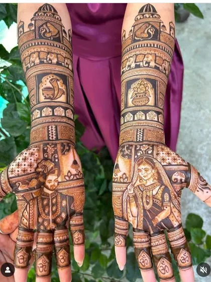 This design is a masterpiece of portraiture, with the bride and groom on the palms. The arms are filled with auspicious wedding symbols and a procession of elephants.