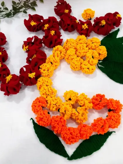 Another rangoli idea, this time creating a heart and 'Om' symbol with crochet hibiscus and marigold flowers. These are especially loved by my customers living abroad who miss fresh flowers during Indian festivals.