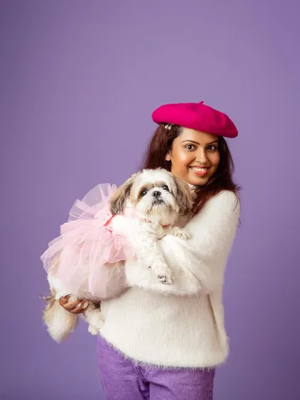 Ooh la la! This "Emily in Paris" inspired studio shoot was so much fun. The pink beret and tutu on this adorable Shih Tzu bring a playful and fashionable vibe to the portrait.